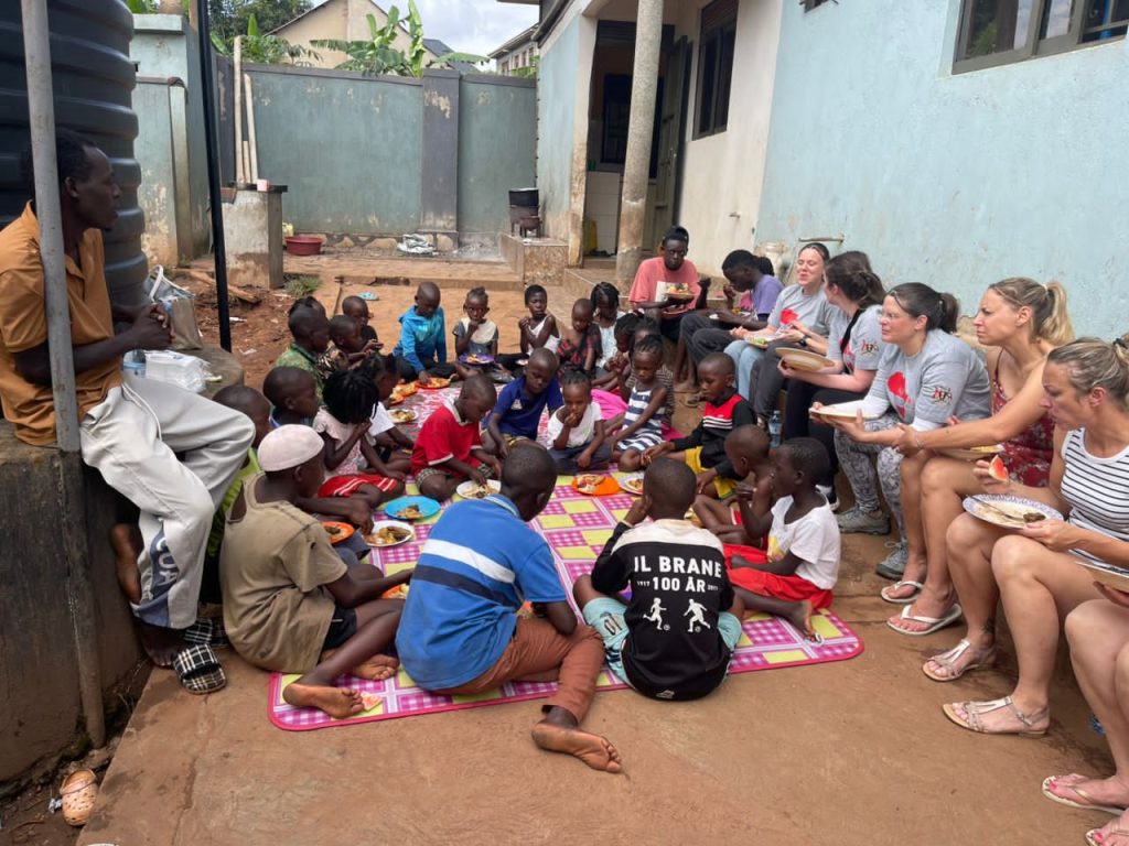 Lunch break after a busy dental camp - Full immersion with the orphans When tourism gives back to the community. Free Dental camp at Aimers kids foundation